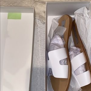 White Steve Madden sandals , just wrong size